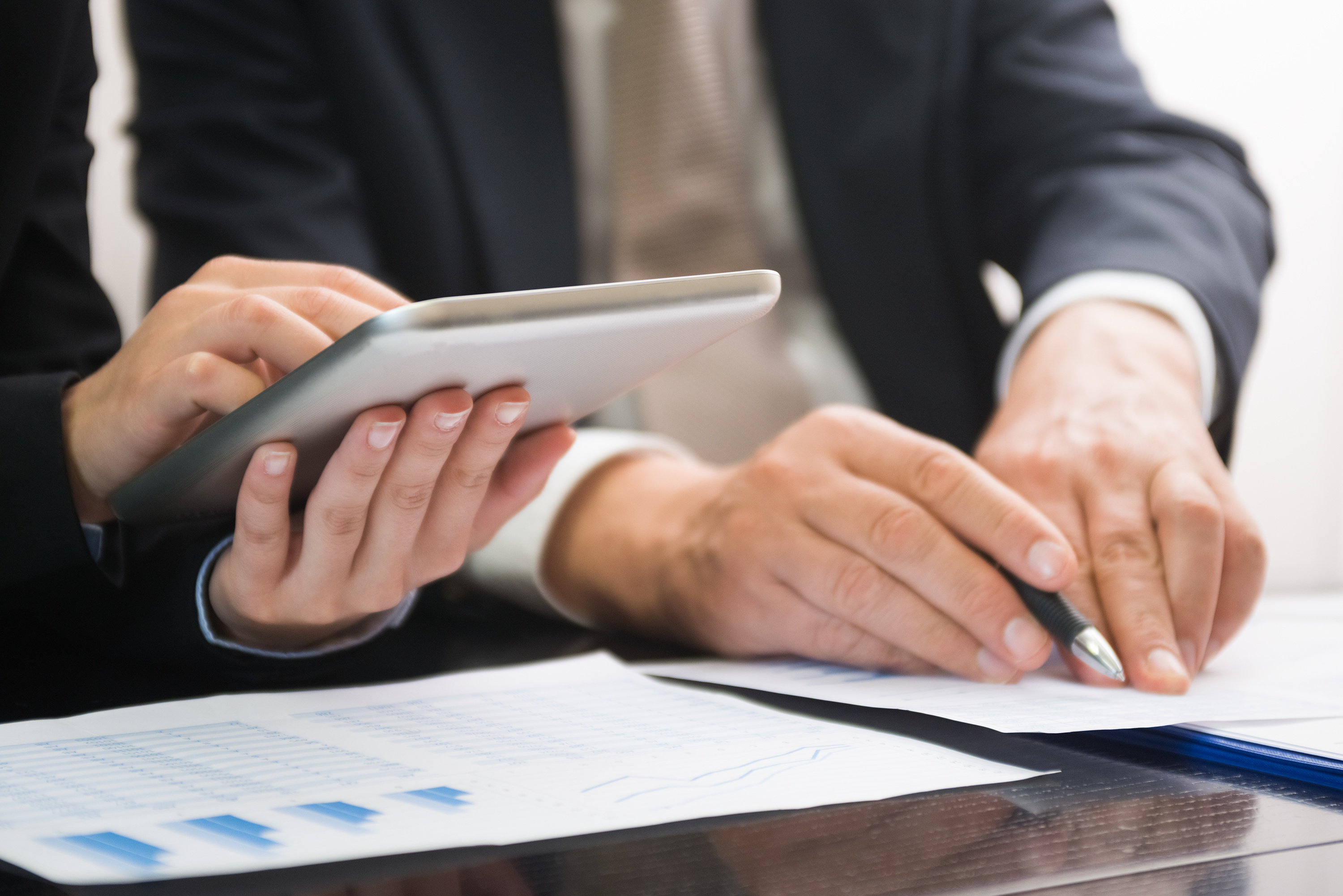 Close-up of business people at work