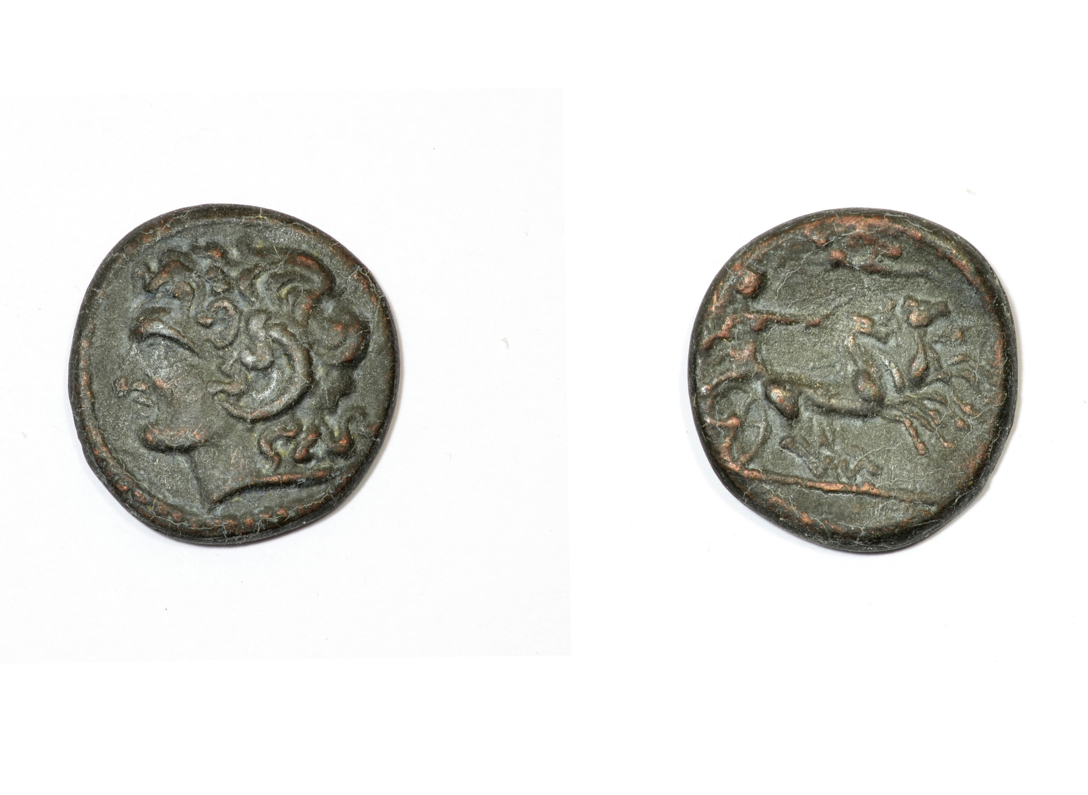 Ancient Greek coin. Alexander the Great and Apollo with the chariot of the sun. Image courtesy of Adobe Stock.