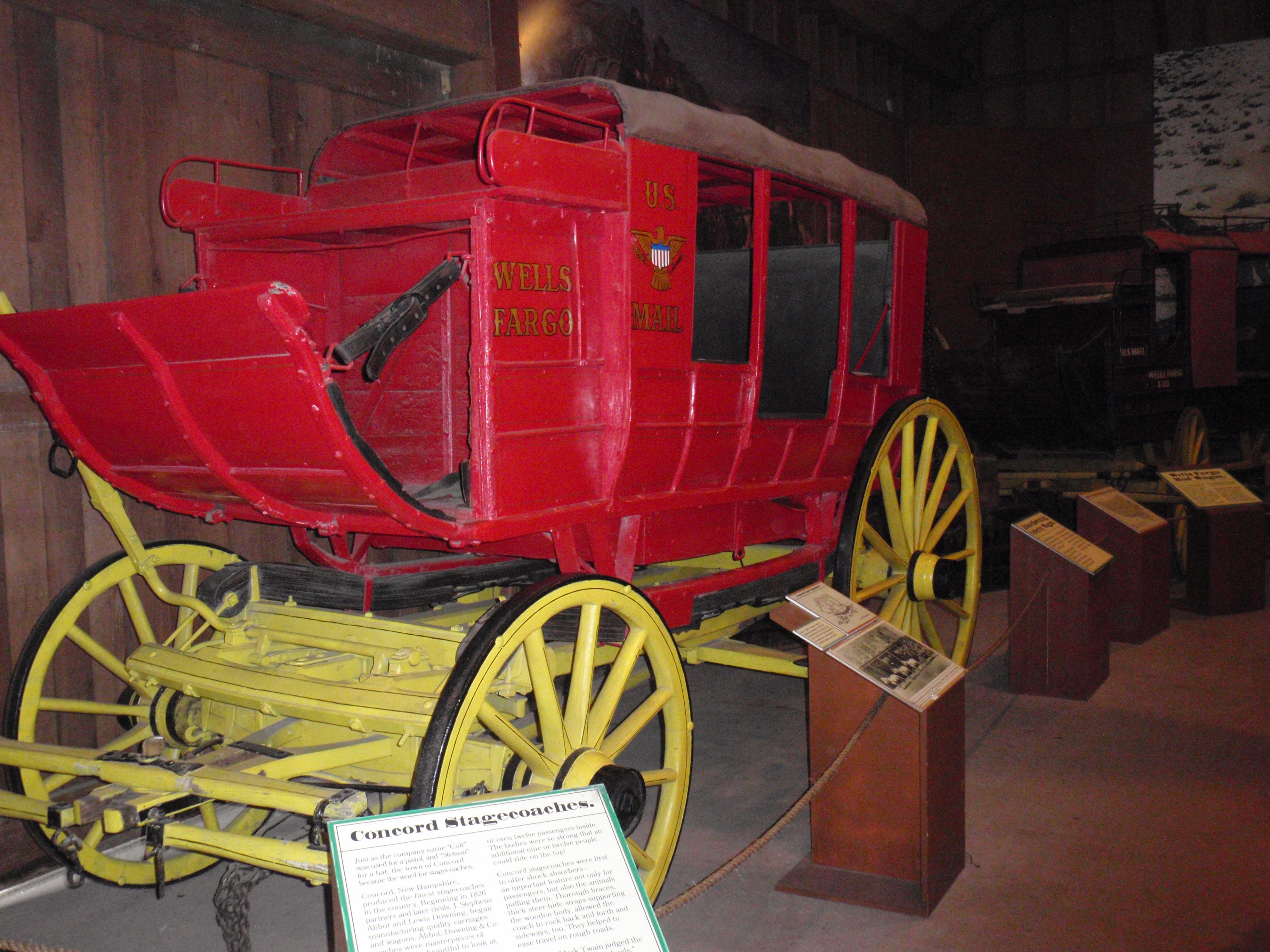 Concord stagecoach painted in Wells Fargo colors, housed at the Seeley Stable Museum Hazard Collection in Old Town San Diego Historic Park. April 2012 photo by James Ulvog.