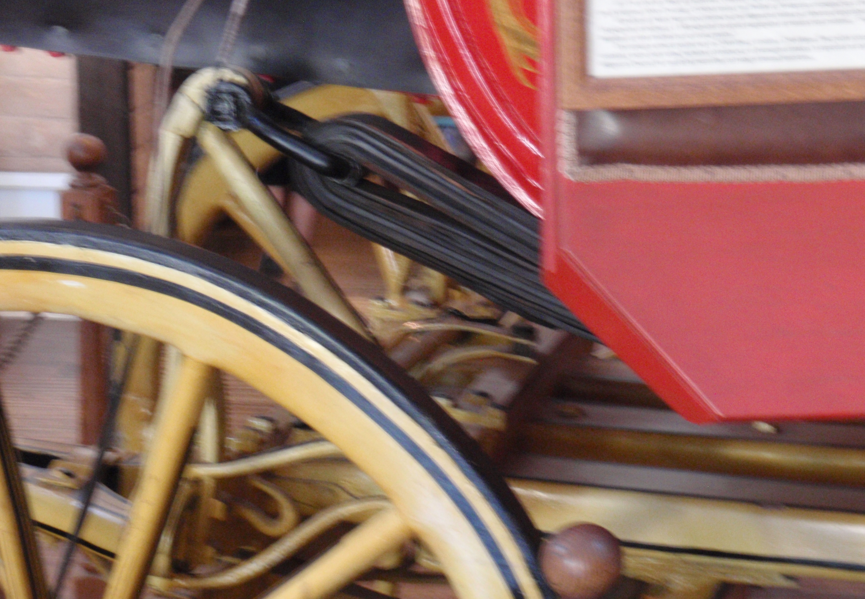 Out of focus view of suspension on a Concord coach. October 2016 photo at Wells Fargo's museum in San Diego by James Ulvog.